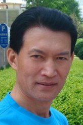 梁军英